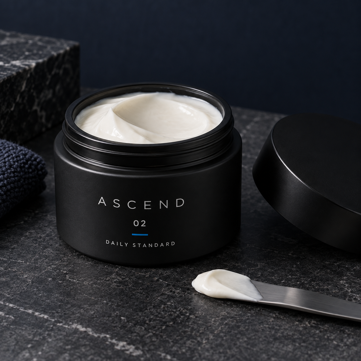 Illustrative ASCEND face cream concept with an open jar and cream on a spatula